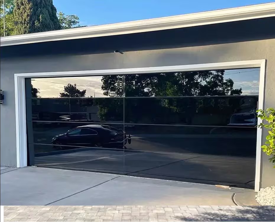 Frameless full-view glass garage door, second example on a different home